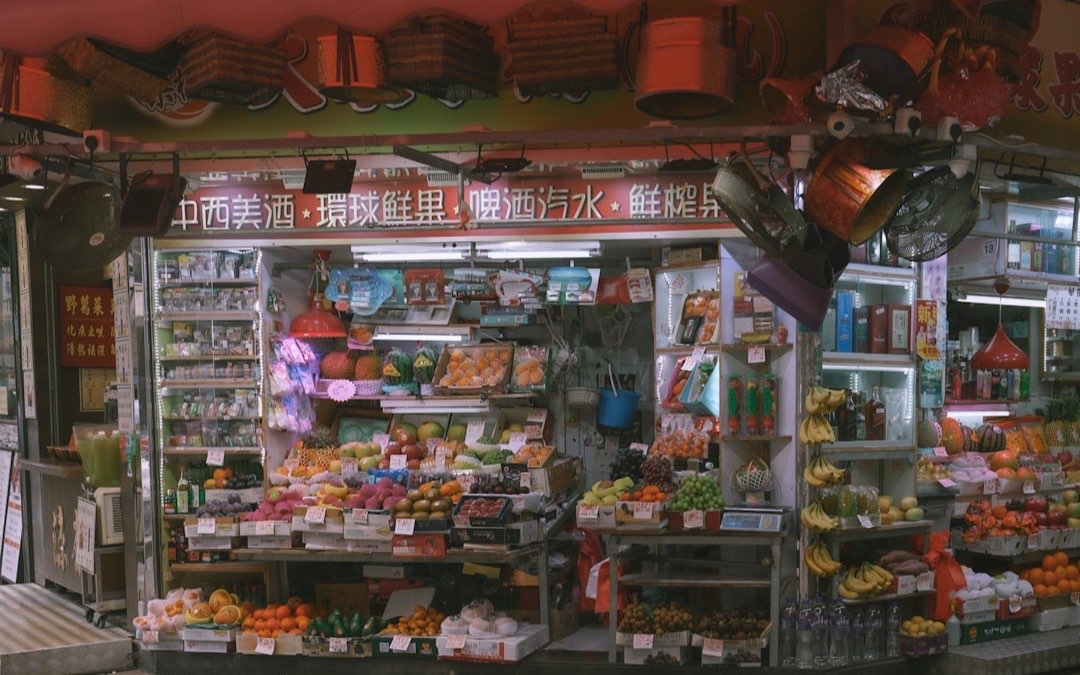 Storefront grocery with fresh fruit and vegetables on display