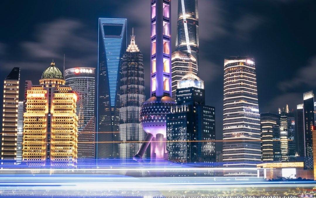 Long-exposure view of Shanghai traffic and towers at night