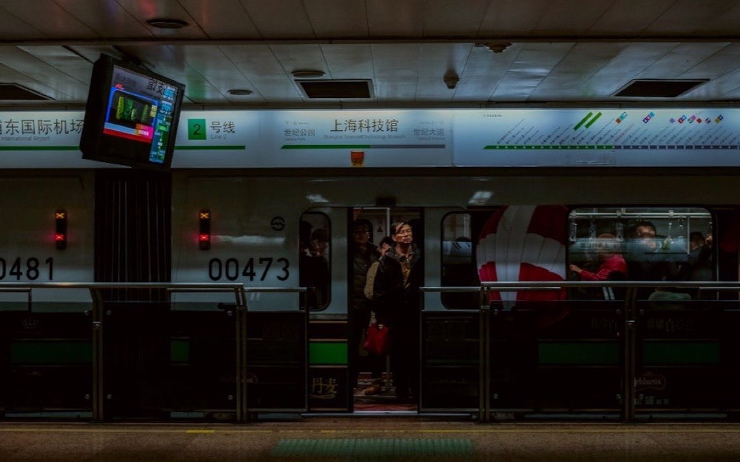Passengers riding inside a metro train carriage